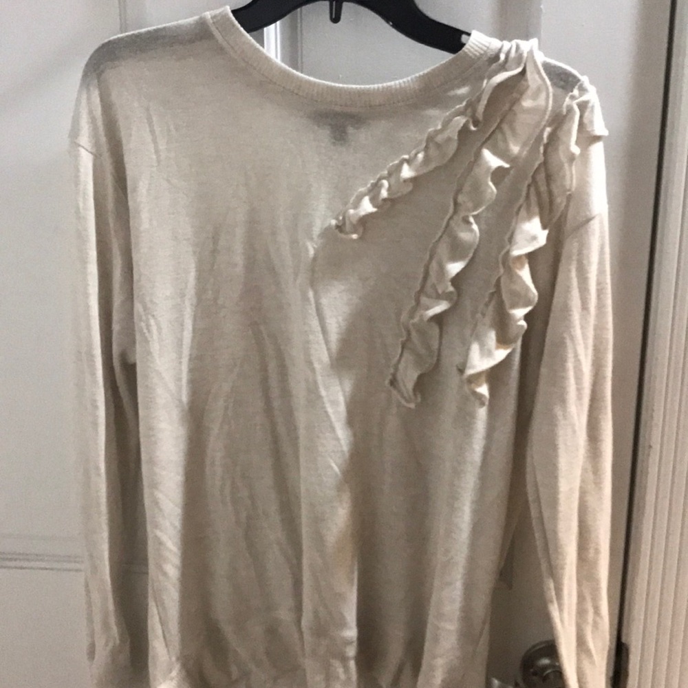 Cream sweater with ruffles